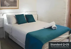 Standard family room with a queen bed and single beds